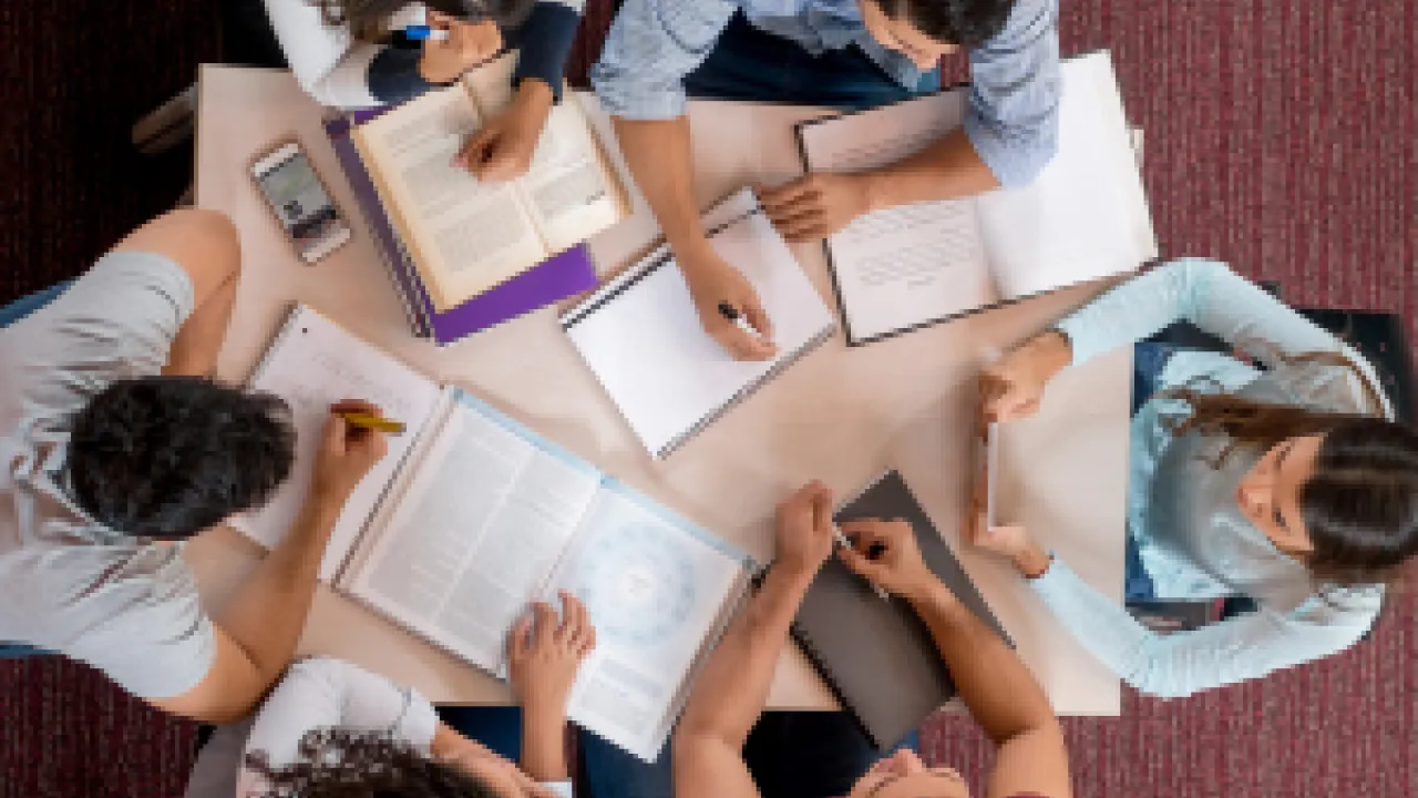 college students around a table