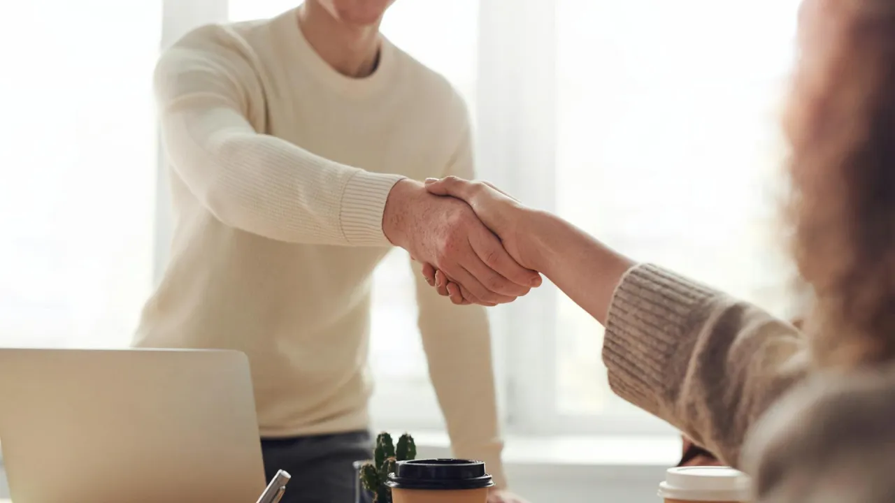 Two people shaking hands