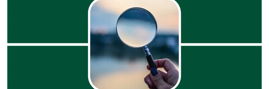A microscope faces out onto a lake at dusk