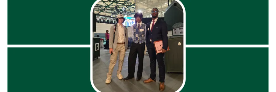 Students at the Charlotte Career Fair pose in their professional clothing and resumes