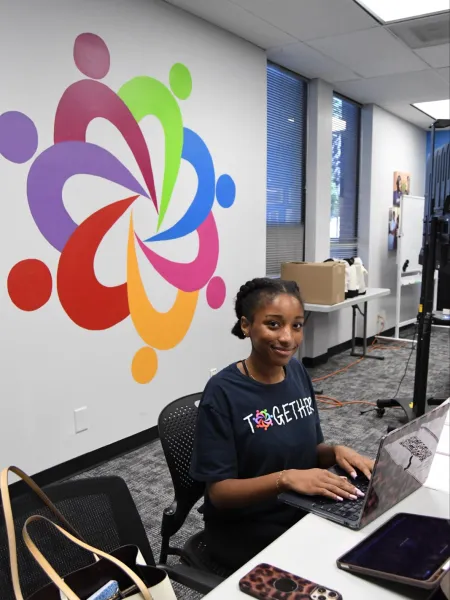 Jiya Heath at her UNC Charlotte SECU Public Fellows Internship workspace 