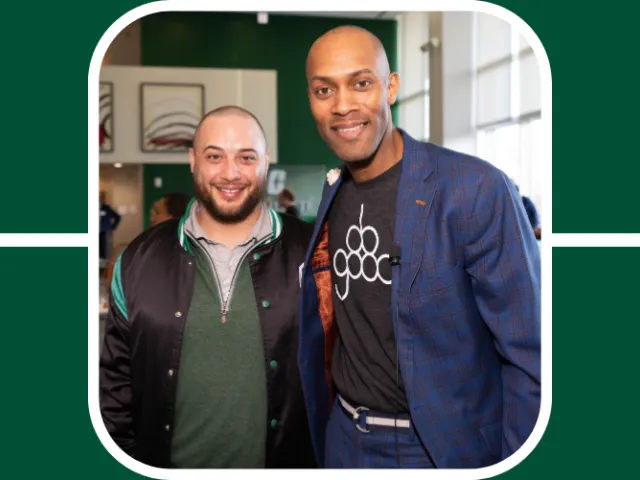 Chris Moxley of Do Good and 704 shop poses with an alumni at a UNC Charlotte speaking event