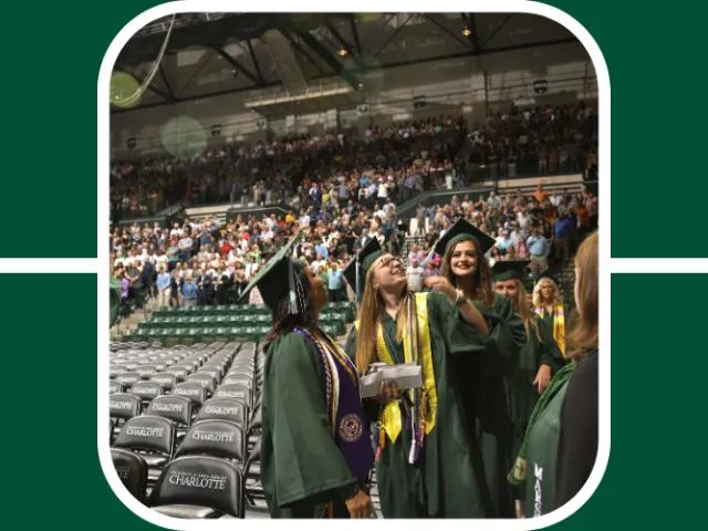 Students at graduation headed out of the arena