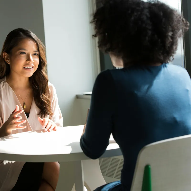 Two women talking