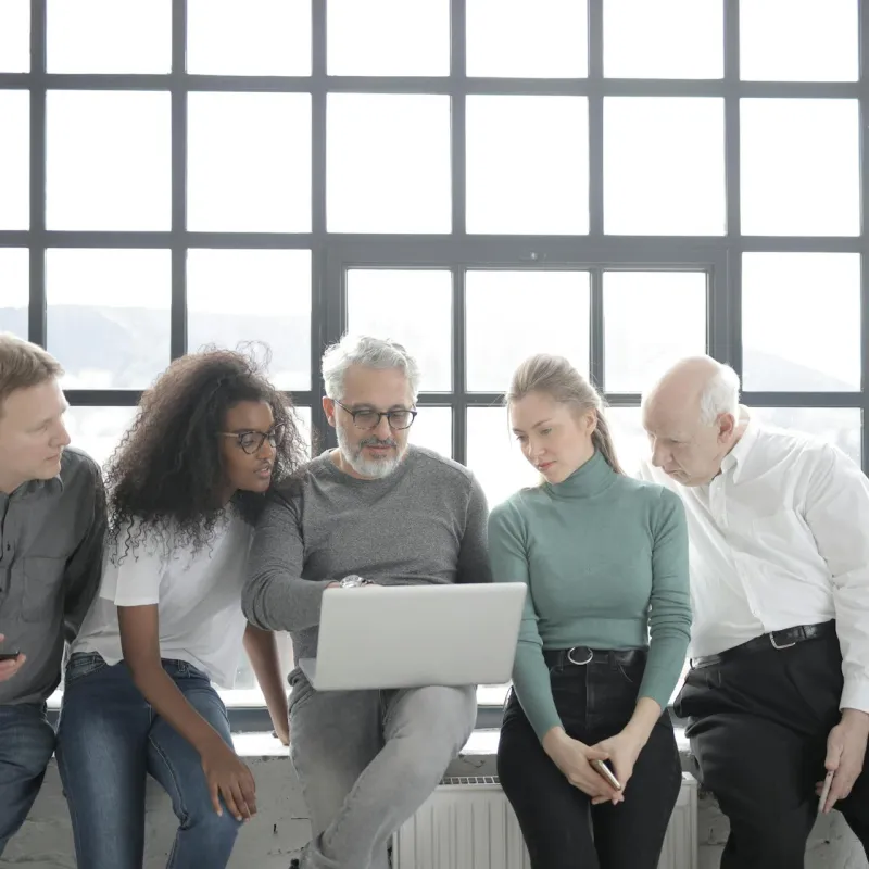 People looking at computer