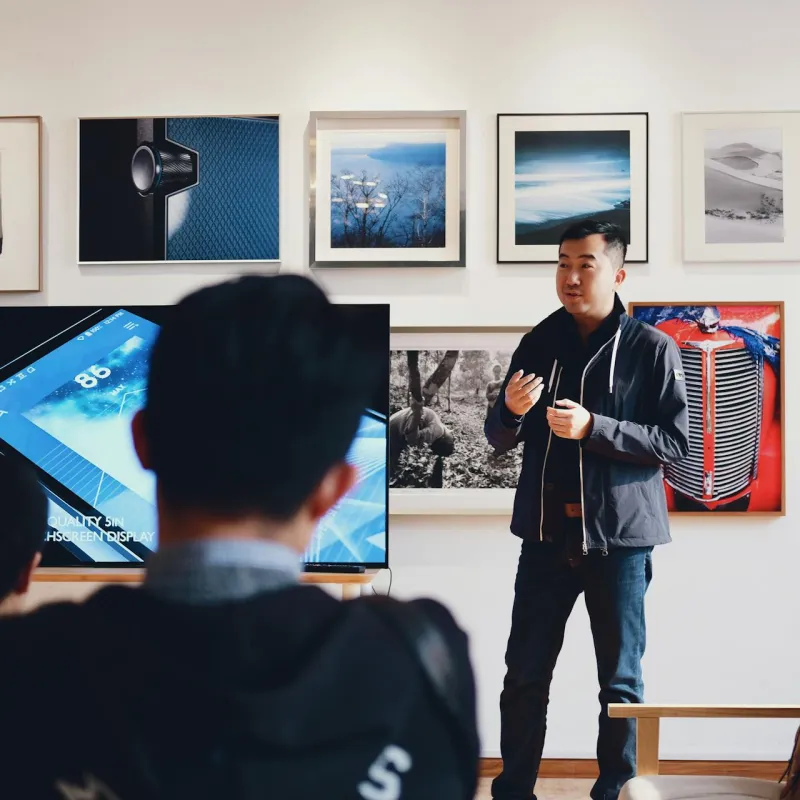 Presenter in art gallery